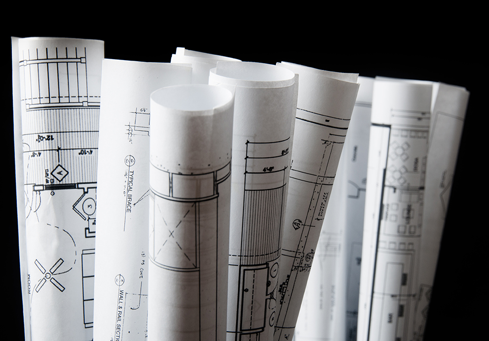 rolls of architecture blueprints and house plans