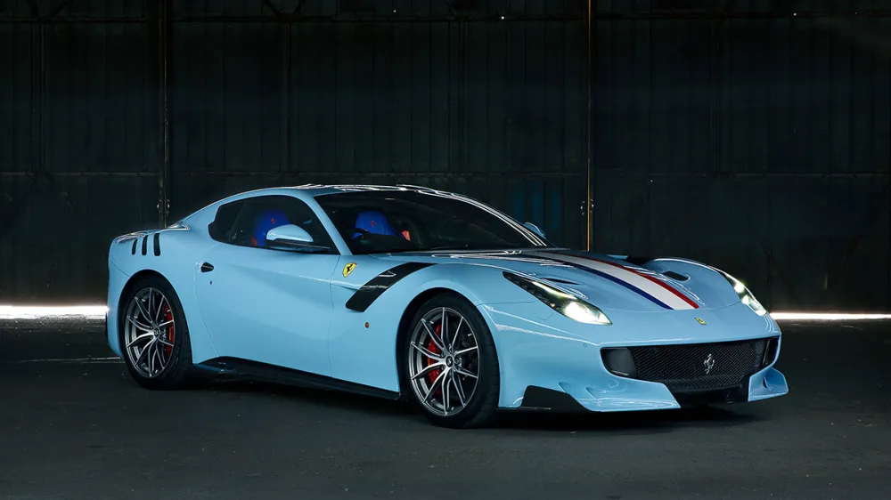 nice angle of a blue ferrari